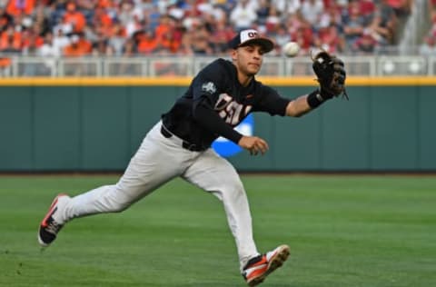 Omaha, NE – JUNE 26: Infielder Nick Madrigal #3 of the Oregon State Beavers chases after a chopper through the infield in the fifth inning against the Arkansas Razorbacks during game one of the College World Series Championship Series on June 26, 2018 at TD Ameritrade Park in Omaha, Nebraska. (Photo by Peter Aiken/Getty Images)