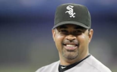 TORONTO – APRIL 12: Manager Ozzie Guillen #13 of the Chicago White Sox smiles against the Toronto Blue Jays during their MLB game at the Rogers Centre April 12, 2010 in Toronto, Ontario.(Photo By Dave Sandford/Getty Images)