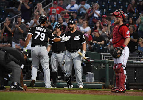 GOODYEAR, ARIZONA – MARCH 19: Jose Abreu #79 of the Chicago White Sox celebrates with teammate Yonder Alonso #17 after hitting a home run during the third inning of a spring training game against the Cincinnati Reds at Goodyear Ballpark on March 19, 2019 in Goodyear, Arizona. (Photo by Norm Hall/Getty Images)