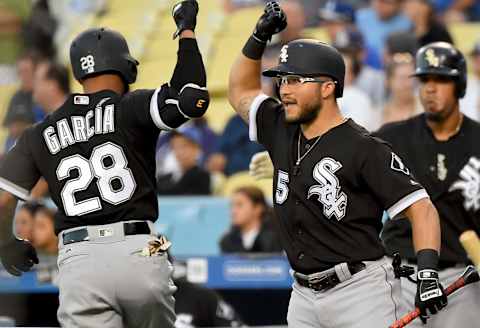 LOS ANGELES, CA – AUGUST 16: Leury Garcia #28 of the Chicago White Sox is greeted by Yolmer Sanchez #5 of the Chicago White Sox after hitting a solo home run in the first inning of the game off Yu Darvish #21 of the Los Angeles Dodgers at Dodger Stadium on August 16, 2017 in Los Angeles, California. (Photo by Jayne Kamin-Oncea/Getty Images)