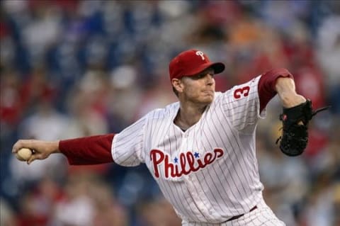 Sep 4, 2013; Philadelphia, PA, USA; Philadelphia Phillies pitcher Roy Halladay (34) delivers to the plate during the first inning against the Washington Nationals at Citizens Bank Park. Mandatory Credit: Howard Smith-USA TODAY Sports