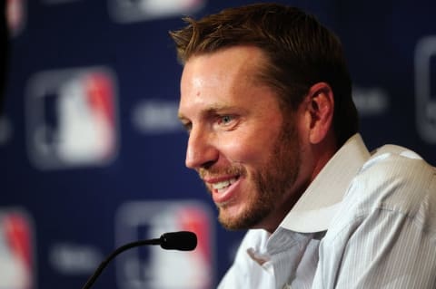 Dec 9, 2013; Orlando, FL, USA; Roy Halladay announces his retirement the MLB Winter Meetings at Walt Disney World Swan and Dolphin Resort. Halladay signed a one-day contract and retired with the Toronto Blue Jays. Mandatory Credit: David Manning-USA TODAY Sports