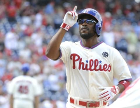 Aug 24, 2014; Philadelphia, PA, USA; Philadelphia Phillies shortstop Jimmy Rollins (11) celebrates his home run in the seventh inning against the St. Louis Cardinals at Citizens Bank Park. The Phillies defeated the Cardinals, 7-1. Mandatory Credit: Eric Hartline-USA TODAY Sports