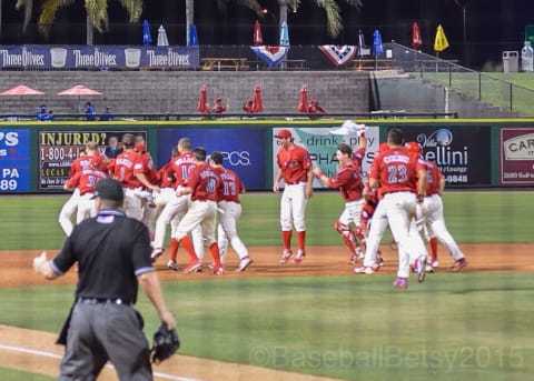 The Clearwater Threshers stormed the field after the 11th inning walkoff run was scored.