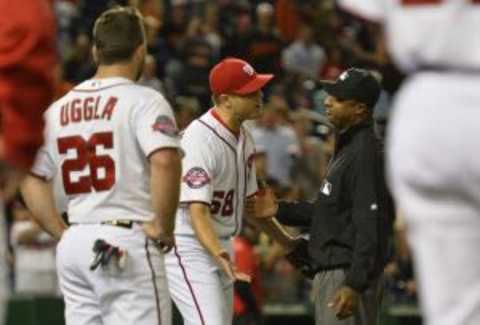 Sep 23, 2015; Washington, DC, USA; Washington Nationals relief pitcher Jonathan Papelbon (58) argues with second base umpire Alan Porter (64) after being ejected from the game during the ninth inning against the Baltimore Orioles at Nationals Park. Baltimore Orioles defeated Washington Nationals 4-3. Mandatory Credit: Tommy Gilligan-USA TODAY Sports