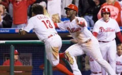 Apr 20, 2016; Philadelphia, PA, USA; Philadelphia Phillies center fielder Herrera (37) reacts as shortstop Galvis (13) scores the game winning run during the eleventh inning against the New York Mets at Citizens Bank Park. The Philadelphia Phillies won 5-4 in the eleventh inning. (Photo Credit: Bill Streicher-USA TODAY Sports)