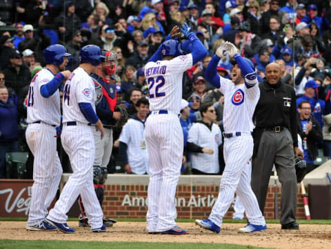 Apr 29, 2016; Chicago, IL, USA; Chicago Cubs left fielder Szczur (Right) is greeted by his teammates after hitting a grand slam home run against the Atlanta Braves during the eighth inning at Wrigley Field. (Photo Credit: David Banks-USA TODAY Sports)