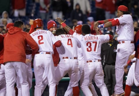 Apr 29, 2016; Philadelphia, PA, USA; Philadelphia Phillies first baseman Ryan Howard (6) is mobbed by his team after hitting a game winning home run during the eleventh inning against the Cleveland Indians at Citizens Bank Park. The Philadelphia Phillies won 4-3. (Photo Credit: Bill Streicher-USA TODAY Sports)