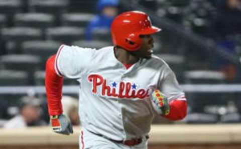 Apr 9, 2016; New York City, NY, USA; Philadelphia Phillies first baseman Howard (6) watches his home run while rounding the bases during the fifth inning against the New York Mets at Citi Field. (Photo Credit: Anthony Gruppuso-USA TODAY Sports)