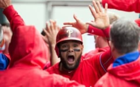 May 18, 2016; Philadelphia, PA, USA; Philadelphia Phillies second baseman Andres Blanco (4) reacts in the dugout after scoring during the third inning against the Miami Marlins at Citizens Bank Park. Mandatory Credit: Bill Streicher-USA TODAY Sports