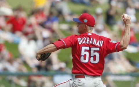 Mar 11, 2016; Lake Buena Vista, FL, USA; Philadelphia Phillies starting pitcher David Buchanan (55) pitches against the Atlanta Braves during the first inning at Champion Stadium. Mandatory Credit: Butch Dill-USA TODAY Sports