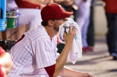 Jun 16, 2016; Philadelphia, PA, USA; Philadelphia Phillies starting pitcher Nola (27) reacts in the dugout after being relieved in the fourth inning against the Toronto Blue Jays at Citizens Bank Park. Mandatory Credit: Bill Streicher-USA TODAY Sports