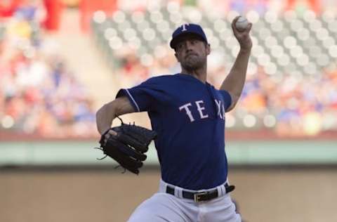 Jun 7, 2016; Arlington, TX, USA; Texas Rangers starting pitcher Cole Hamels (35) pitches against the Houston Astros during the second inning at Globe Life Park in Arlington. Mandatory Credit: Jerome Miron-USA TODAY Sports