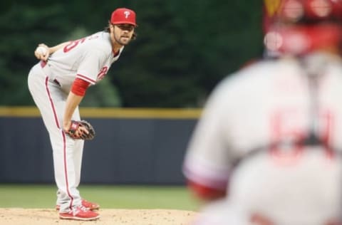 May 18, 2015; Denver, CO, USA; Philadelphia Phillies starting pitcher Hamels (35) delivers a pitch during the game against the Colorado Rockies at Coors Field. Mandatory Credit: Chris Humphreys-USA TODAY Sports