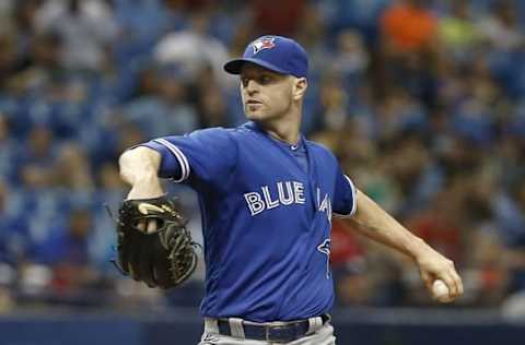 Apr 30, 2016; St. Petersburg, FL, USA; Toronto Blue Jays starting pitcher Happ (33) throws a pitch during the first inning of a baseball game against the Tampa Bay Rays at Tropicana Field. Mandatory Credit: Reinhold Matay-USA TODAY Sports