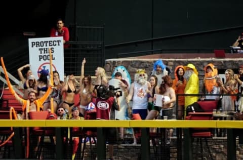 Jun 13, 2016; Phoenix, AZ, USA; Fans cheer from the outfield pool during the game between the Arizona Diamondbacks and the Los Angeles Dodgers at Chase Field. Mandatory Credit: Matt Kartozian-USA TODAY Sports