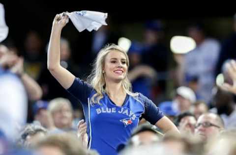 May 18, 2016; Toronto, Ontario, CAN; Toronto Blue Jays cheerleader waves a rally towel during MLB game action against the Tampa Bay Rays at Rogers Centre. Mandatory Credit: Kevin Sousa-USA TODAY Sports