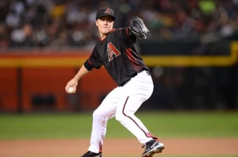 Apr 30, 2016; Phoenix, AZ, USA; Arizona Diamondbacks starting pitcher Greinke (21) pitches during the first inning against the Colorado Rockies at Chase Field. Mandatory Credit: Joe Camporeale-USA TODAY Sports