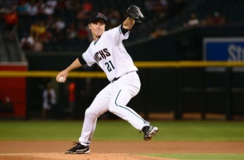 Jun 7, 2016; Phoenix, AZ, USA; Arizona Diamondbacks starting pitcher Greinke (21) delivers a pitch in the first inning against the Tampa Bay Rays at Chase Field. Mandatory Credit: Jennifer Stewart-USA TODAY Sports