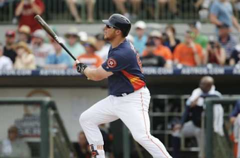 Mar 11, 2016; Kissimmee, FL, USA; Houston Astros first baseman Reed (80) hits a double to right center in the second inning of a spring training baseball game against the Detroit Tigers at Osceola County Stadium. Mandatory Credit: Reinhold Matay-USA TODAY Sports