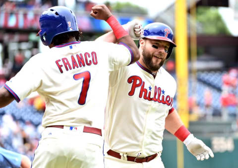 Jul 3, 2016; Philadelphia, PA, USA; Philadelphia Phillies catcher Rupp (29) celebrates with third baseman Franco (7) after hitting a three-run home run during the first inning against the Kansas City Royals at Citizens Bank Park. Mandatory Credit: Eric Hartline-USA TODAY Sports