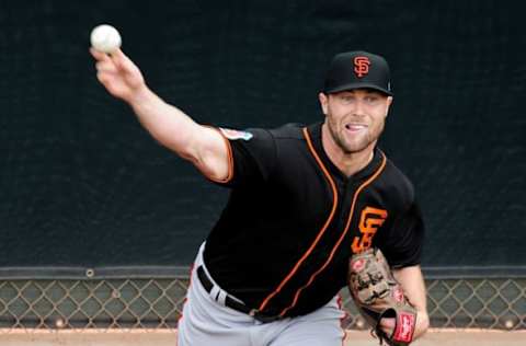 Feb 19, 2016; Scottsdale, AZ, USA; San Francisco Giants relief pitcher Strickland (60) throws during a workout at Scottsdale Stadium. Mandatory Credit: Matt Kartozian-USA TODAY Sports