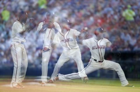 Jun 25, 2016; Atlanta, GA, USA; (EDITORS NOTE: MULTIPLE EXPOSURE IMAGE) Atlanta Braves starting pitcher Teheran (49) throws a pitch against the New York Mets in the fifth inning in this multiple exposure image at Turner Field. Mandatory Credit: Brett Davis-USA TODAY Sports