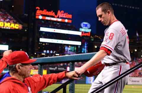 May 2, 2016; St. Louis, MO, USA; Philadelphia Phillies starting pitcher Hellickson (58) is congratulated by bench coach Larry Bowa (10) after scoring during the third inning against the St. Louis Cardinals at Busch Stadium. Mandatory Credit: Jeff Curry-USA TODAY Sports