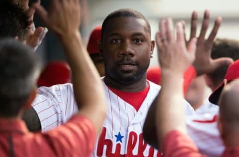 Jul 16, 2016; Philadelphia, PA, USA; Philadelphia Phillies first baseman Howard (6) is congratulated in the dugout after hitting a solo home run during the second inning against the New York Mets at Citizens Bank Park. Mandatory Credit: Bill Streicher-USA TODAY Sports