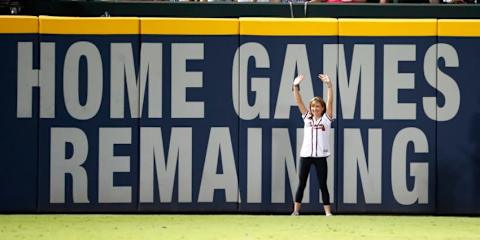 Jul 15, 2016; Atlanta, GA, USA; 1996 olympian Shannon Miller acknowledges the crowd after she turned the number of game remaining at Turner Field from 34 to 33 in the fifth inning of the Atlanta Braves game against the Colorado Rockies at Turner Field. Mandatory Credit: Jason Getz-USA TODAY Sports