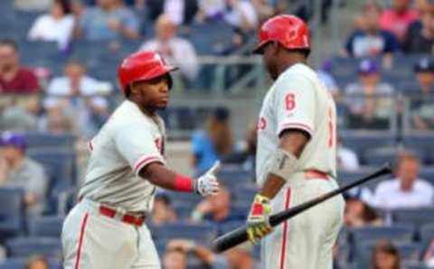 Jun 22, 2015; Bronx, NY, USA; Philadelphia Phillies third baseman Maikel Franco (7) celebrates with first baseman Ryan Howard (6) after hitting a solo home run against the New York Yankees during the first inning at Yankee Stadium. Mandatory Credit: Brad Penner-USA TODAY Sports