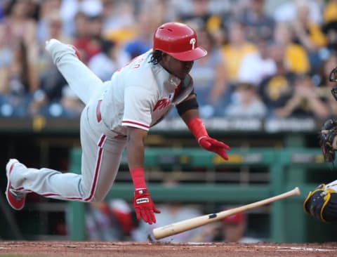 Jul 22, 2016; Pittsburgh, PA, USA; Philadelphia Phillies third baseman Franco (7) reacts after being hit by a pitch from Pittsburgh Pirates starting pitcher Gerrit Cole (not pictured) during the first inning at PNC Park. Mandatory Credit: Charles LeClaire-USA TODAY Sports