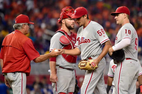 Jul 27, 2016; Miami, FL, USA; Philadelphia Phillies starting pitcher Eflin (56) is taken out of the game by Phillies manager Pete Mackanin (45) during the sixth inning against the Miami Marlins at Marlins Park. The Marlins won 11-1. Mandatory Credit: Steve Mitchell-USA TODAY Sports