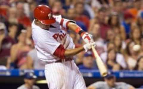 Aug 18, 2016; Philadelphia, PA, USA; Philadelphia Phillies right fielder Aaron Altherr (23) hits a single during the fourth inning against the Los Angeles Dodgers at Citizens Bank Park. Mandatory Credit: Bill Streicher-USA TODAY Sports