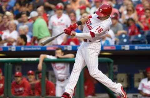 Aug 20, 2016; Philadelphia, PA, USA; Philadelphia Phillies second baseman Cesar Hernandez (16) hits a solo home run against the St. Louis Cardinals during the first inning at Citizens Bank Park. Mandatory Credit: Bill Streicher-USA TODAY Sports