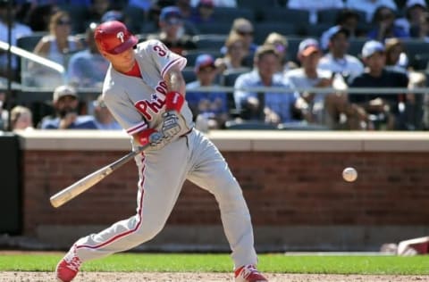 Aug 28, 2016; New York City, NY, USA; Philadelphia Phillies catcher A.J. Ellis (34) hits a two run double against the New York Mets during the seventh inning at Citi Field. The Phillies won 5-1. Mandatory Credit: Andy Marlin-USA TODAY Sports