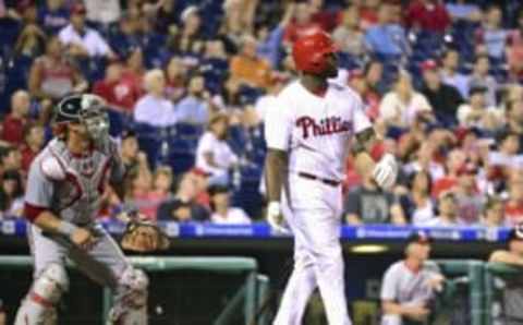 Aug 30, 2016; Philadelphia, PA, USA; Philadelphia Phillies first baseman Howard (6) hits a two run home run during the seventh inning against the Washington Nationals at Citizens Bank Park. The Nationals defeated the Phillies, 3-2. Mandatory Credit: Eric Hartline-USA TODAY Sports