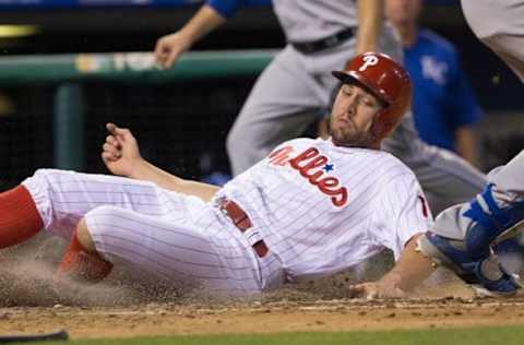 Jul 1, 2016; Philadelphia, PA, USA; Philadelphia Phillies right fielder Bourjos (17) scores on a slide past Kansas City Royals catcher Salvador Perez (not pictured) during the fifth inning at Citizens Bank Park. Mandatory Credit: Bill Streicher-USA TODAY Sports