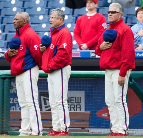 Oct 1, 2015; Philadelphia, PA, USA; Philadelphia Phillies manager Mackanin (R) and bench coach Bowa (M) and first base coach Samuel (L) stand for the national anthem before a game against the New York Mets at Citizens Bank Park. The Phillies won 3-0. Mandatory Credit: Bill Streicher-USA TODAY Sports