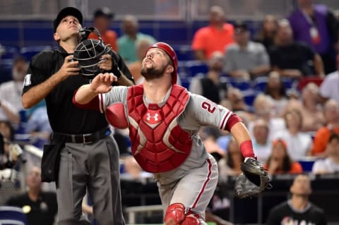 Jul 27, 2016; Miami, FL, USA; Philadelphia Phillies catcher Rupp (29) chases a foul ball during the sixth inning against the Miami Marlins at Marlins Park. The Marlins won 11-1. Mandatory Credit: Steve Mitchell-USA TODAY Sports