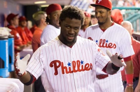 Aug 19, 2016; Philadelphia, PA, USA; Philadelphia Phillies center fielder Odubel Herrera (37) reacts in the dugout after hitting a home run during the sixth inning against the St. Louis Cardinals at Citizens Bank Park. Mandatory Credit: Bill Streicher-USA TODAY Sports