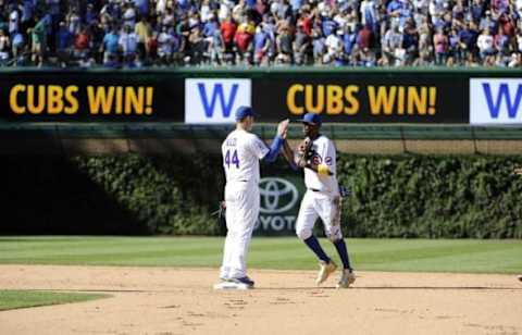 Sep 2, 2016; Chicago, IL, USA; Chicago Cubs first baseman Rizzo (44) and center fielder Fowler (24) celebrate their win against the San Francisco Giants at Wrigley Field. The Cubs won 2-1. Mandatory Credit: David Banks-USA TODAY Sports