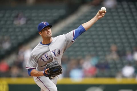 Sep 5, 2016; Seattle, WA, USA; Texas Rangers starting pitcher Cole Hamels (35) throws against the Seattle Mariners during the first inning at Safeco Field. Mandatory Credit: Joe Nicholson-USA TODAY Sports