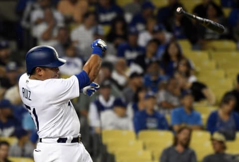 September 7, 2016; Los Angeles, CA, USA; Los Angeles Dodgers catcher Carlos Ruiz (51) loses grip of his bat while hitting in the first inning against Arizona Diamondbacks at Dodger Stadium. Mandatory Credit: Richard Mackson-USA TODAY Sport