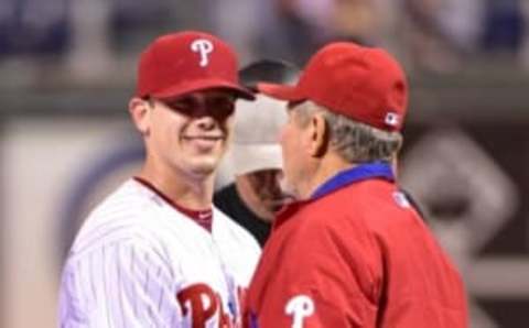 Sep 17, 2016; Philadelphia, PA, USA; Philadelphia Phillies starting pitcher Hellickson (58) celebrates with coaches after pitching a complete game three hit shutout against the Miami Marlins at Citizens Bank Park. The Phillies defeated the Marlins, 8-0. Mandatory Credit: Eric Hartline-USA TODAY Sports