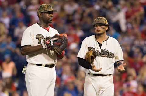 May 30, 2016; Philadelphia, PA, USA; Philadelphia Phillies first baseman Ryan Howard (6) talks with shortstop Freddy Galvis (13) against the Washington Nationals at Citizens Bank Park. The Washington Nationals won 4-3. Mandatory Credit: Bill Streicher-USA TODAY Sports