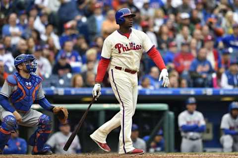 Oct 1, 2016; Philadelphia, PA, USA; Philadelphia Phillies first baseman Ryan Howard (6) watches the ball after hitting a two-run home run during the fifth inning against the New York Mets at Citizens Bank Park. Mandatory Credit: Derik Hamilton-USA TODAY Sports