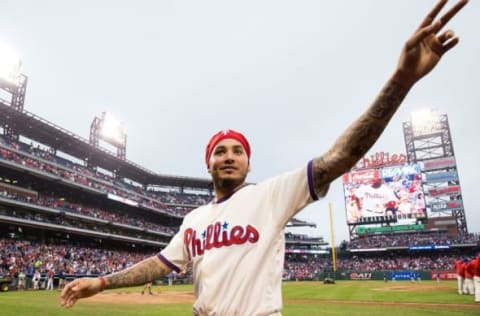 Oct 2, 2016; Philadelphia, PA, USA; Philadelphia Phillies shortstop Freddy Galvis (13) waves to the fans as he walks off the field after a victory against the New York Mets at Citizens Bank Park. The Philadelphia Phillies won 5-2. Mandatory Credit: Bill Streicher-USA TODAY Sports