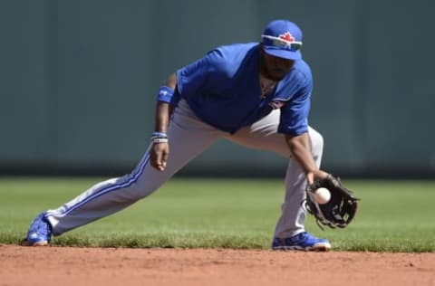 Mar 4, 2015; Bradenton, FL, USA; Toronto Blue Jays infielder Dwight Smith (74) fields a grounder during warm ups for the spring training baseball game against the Pittsburgh Pirates at McKechnie Field. Mandatory Credit: Tommy Gilligan-USA TODAY Sports