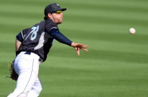 Mar 4, 2015; Peoria, AZ, USA; Seattle Mariners shortstop Tyler Smith (78) flips the ball to second base against the San Diego Padres during a spring training baseball game at Peoria Sports Complex. Mandatory Credit: Joe Camporeale-USA TODAY Sports